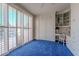 Bright bedroom with custom built-in shelving, a Murphy bed, and shuttered windows at 8196 Horseshoe Bend Ln, Las Vegas, NV 89113