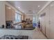 Gourmet kitchen featuring granite counters, light wood cabinetry, and breakfast bar seating at 8196 Horseshoe Bend Ln, Las Vegas, NV 89113