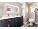 Bathroom with double sink vanity, and illuminated mirror at 8700 Isola Dr, Las Vegas, NV 89117
