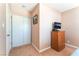 Bedroom featuring a closet, mounted TV, and wooden dresser at 8700 Isola Dr, Las Vegas, NV 89117