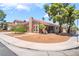 Charming single-story home with a well-manicured front yard and inviting curb appeal at 8700 Isola Dr, Las Vegas, NV 89117