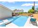 Inviting backyard pool and patio area, perfect for relaxation and outdoor entertaining at 8700 Isola Dr, Las Vegas, NV 89117