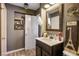 Well-appointed bathroom featuring a vanity, toilet, and an ample storage at 8884 Perfect Diamond Ct, Las Vegas, NV 89129