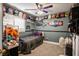 Quirky bedroom showcasing unique decor, a comfortable bed, and a cozy ambiance at 8884 Perfect Diamond Ct, Las Vegas, NV 89129