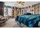 Comfortable bedroom featuring carpet, a ceiling fan, and lots of storage space at 8884 Perfect Diamond Ct, Las Vegas, NV 89129
