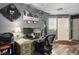 Functional home office space with laminate floors and stylish decor at 8884 Perfect Diamond Ct, Las Vegas, NV 89129