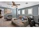 Inviting living space with comfortable seating and bright windows creating a cozy atmosphere at 8884 Perfect Diamond Ct, Las Vegas, NV 89129