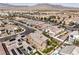 Wide shot of the neighborhood displaying the home's location near parks and a distant mountain range at 9655 Skye Star Ave, Las Vegas, NV 89166