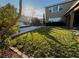 Backyard featuring a lawn, and an outdoor hot tub and water feature at 9655 Skye Star Ave, Las Vegas, NV 89166