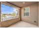 Relaxing balcony with a view of the neighborhood and a window to the left at 9655 Skye Star Ave, Las Vegas, NV 89166