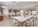 Bright, open kitchen and dining area with a large island, stainless appliances, and modern finishes at 9655 Skye Star Ave, Las Vegas, NV 89166