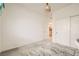 Bedroom with an empty floor and double sliding door closet at 9698 Pacific Pine St, Las Vegas, NV 89143