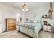 Comfortable bedroom with a queen-sized bed and bedside tables on each side at 9698 Pacific Pine St, Las Vegas, NV 89143