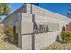 Community sign with stone base and landscaping at 9698 Pacific Pine St, Las Vegas, NV 89143