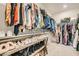 Spacious walk-in closet with ample storage and shoe rack at 9698 Pacific Pine St, Las Vegas, NV 89143