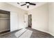 Bedroom with carpet, a ceiling fan, closet, and an en suite bathroom at 9705 Standard Ave, Las Vegas, NV 89129