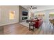 Bright living room features a modern fireplace, hardwood floors, and a comfortable seating area at 9705 Standard Ave, Las Vegas, NV 89129