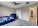 Comfortable bedroom includes a fan and closet, and has easy access to the hallway at 9846 Sunriver Meadows Ave, Las Vegas, NV 89148