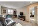 Upstairs bonus room features a seating area and desk; a comfortable and versatile living space at 9846 Sunriver Meadows Ave, Las Vegas, NV 89148