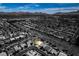 A neighborhood view of the property outlined in green with mountains in the background at 1017 Guided Dancer Ave, Henderson, NV 89015
