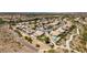 The layout of the neighborhood highlights desert landscaping, walking paths, and a community pool at 1017 Guided Dancer Ave, Henderson, NV 89015