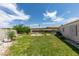 Lawn with patio and side yard with plenty of space at 1017 Guided Dancer Ave, Henderson, NV 89015
