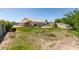 Expansive backyard showing lawn, patio, and potential for landscaping at 1017 Guided Dancer Ave, Henderson, NV 89015