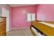 Cozy bedroom features a twin bunk bed, neutral carpet, and a window with shutter-style blinds at 1017 Guided Dancer Ave, Henderson, NV 89015