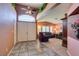 Spacious foyer featuring tile flooring, a high ceiling, and an open view to the living area at 1017 Guided Dancer Ave, Henderson, NV 89015