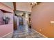 Inviting foyer with tile flooring and high ceilings, leading into the home at 1017 Guided Dancer Ave, Henderson, NV 89015