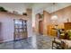 Bright hallway with tiled flooring, decorative nooks, and built-in wooden desk at 1017 Guided Dancer Ave, Henderson, NV 89015