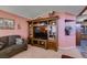 Living room with wooden entertainment center at 1017 Guided Dancer Ave, Henderson, NV 89015