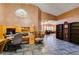 Office area with tiled flooring and a view into the living room at 1017 Guided Dancer Ave, Henderson, NV 89015