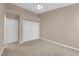 Bedroom with carpet, neutral paint, ceiling fan, closet, and easy access to the rest of the home at 104 Hutton Ln, Las Vegas, NV 89145