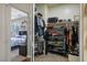 Walk-in closet with ample storage space, shelving units, and access to the bedroom at 10749 Turquoise Valley Dr, Las Vegas, NV 89144
