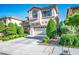 Attractive two-story home boasting a two-car garage, landscaped front yard, and welcoming curb appeal at 10749 Turquoise Valley Dr, Las Vegas, NV 89144