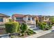 Charming two-story home with a tile roof, manicured landscaping, and an attached two-car garage at 10749 Turquoise Valley Dr, Las Vegas, NV 89144