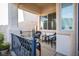 Relaxing front porch featuring comfortable seating and views of the neighborhood at 10749 Turquoise Valley Dr, Las Vegas, NV 89144