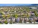 An aerial view displays the neighborhood, featuring well-maintained homes and tree-lined streets at 10749 Turquoise Valley Dr, Las Vegas, NV 89144