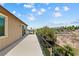 Long balcony with iron railing and beautiful landscape views, perfect for relaxing and enjoying the outdoors at 1134 Pandora Canyon St, Henderson, NV 89052