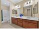 Bright bathroom features double sinks, generous counter space, and a shower-tub combo at 1134 Pandora Canyon St, Henderson, NV 89052