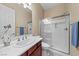 Bathroom features a glass enclosed shower, neutral paint, and stylish sink and hardware at 1134 Pandora Canyon St, Henderson, NV 89052