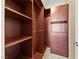 Organized closet featuring shelves, hanging space, and drawers for storage at 1134 Pandora Canyon St, Henderson, NV 89052