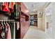 Spacious walk-in closet with custom shelving and drawers providing ample storage and organization at 1134 Pandora Canyon St, Henderson, NV 89052