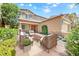 Inviting outdoor patio with stylish seating, creating a perfect space for relaxation and entertaining at 1134 Pandora Canyon St, Henderson, NV 89052
