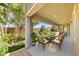 Inviting covered patio with seating area and landscaped backyard views at 1134 Pandora Canyon St, Henderson, NV 89052