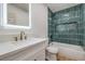 Charming bathroom features modern fixtures, vanity, and bathtub with shower, combining comfort and style at 1209 S 17Th St, Las Vegas, NV 89104