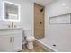 Stylish bathroom showcases a walk-in shower, modern vanity, and elegant fixtures for a spa-like experience at 1209 S 17Th St, Las Vegas, NV 89104