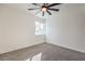 Bedroom with carpeted floors and modern ceiling fan at 1209 S 17Th St, Las Vegas, NV 89104