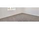 Bright bedroom with a window, neutral carpet, and clean, white walls at 1209 S 17Th St, Las Vegas, NV 89104